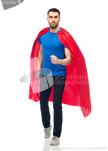 Image of man in red superhero cape