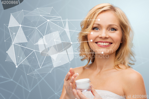 Image of woman with moisturizer and low poly projection