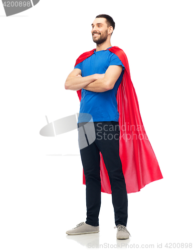 Image of happy man in red superhero cape