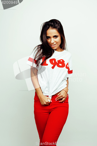 Image of young happy smiling latin american teenage girl emotional posing on white background, lifestyle people concept 