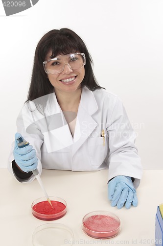 Image of Smiling scientist at work