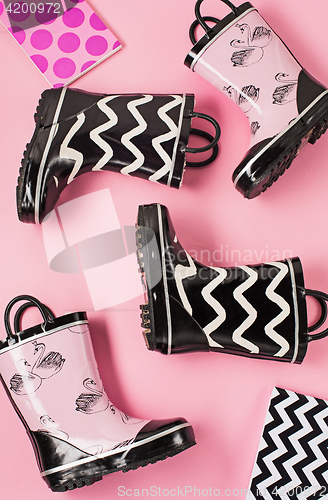 Image of The Black and white rubber boots or gardening boots