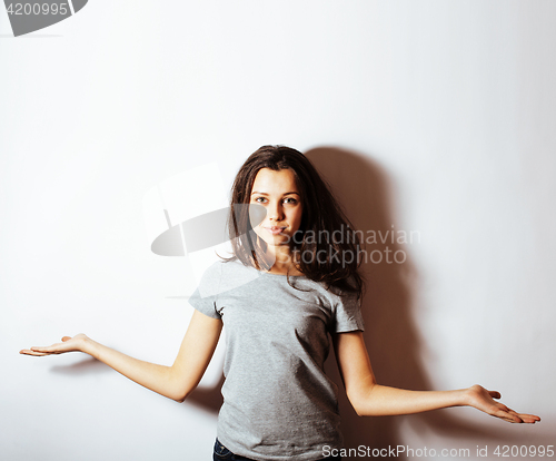 Image of young pretty stylish hipster girl posing emotional isolated on white background happy smiling cool smile, lifestyle people concept