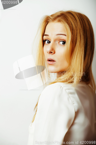 Image of young blond woman on white backgroung gesture thumbs up, isolate