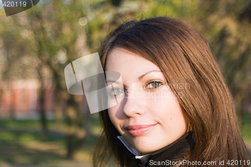 Image of Portrait of the nice girl outdoor 6