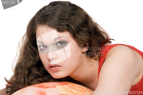 Image of Portrait of the young beauty woman lays on pillow. Isolated 2