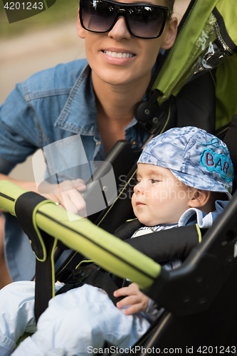 Image of mother and baby in the park