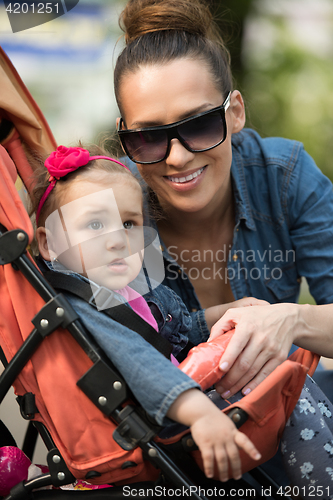 Image of mother and baby in the park