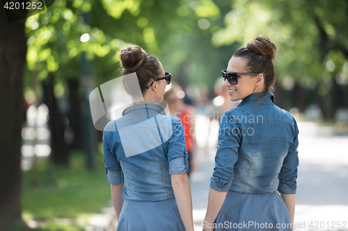 Image of twin sister with sunglasses