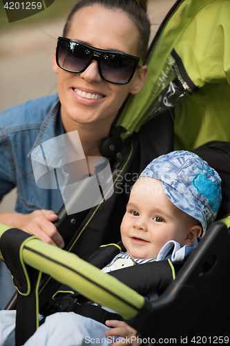 Image of mother and baby in the park