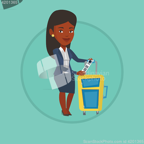 Image of African business woman showing luggage tag.