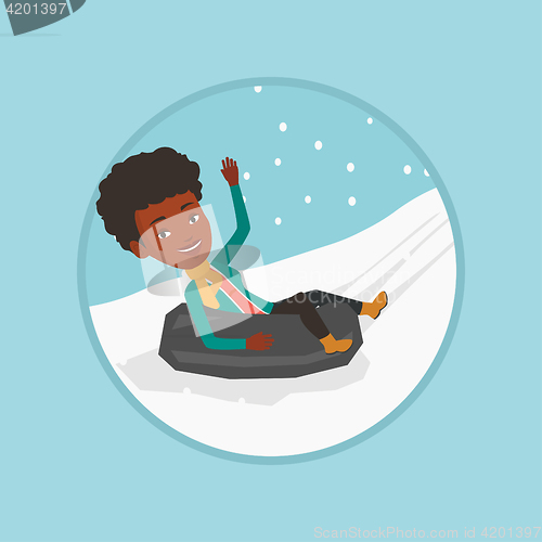 Image of Woman sledding on snow rubber tube in mountains.