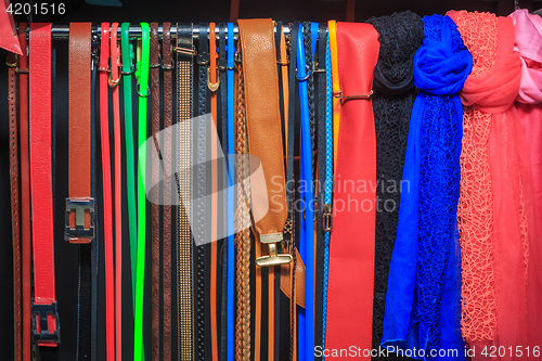 Image of Collection of Colorful  Belts on Rack 