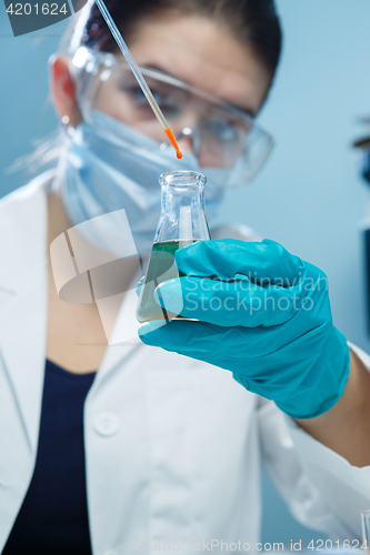 Image of Girl in mask at lab