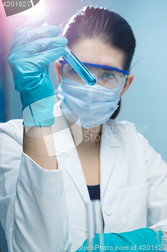 Image of Girl working with test tubes