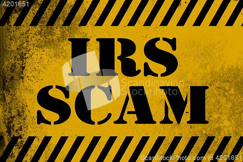 Image of IRS scam sign yellow with stripes