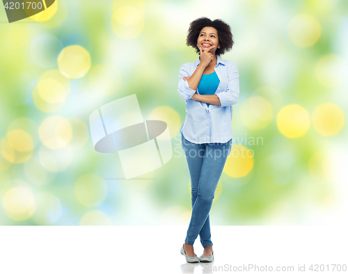 Image of happy african american young woman over white