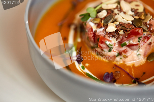 Image of close up of vegetable pumpkin-ginger soup in bowl