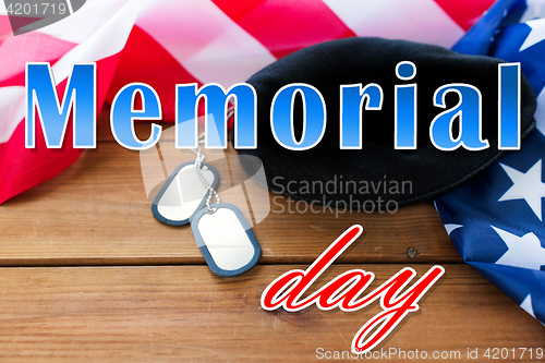 Image of memorial day over american flag, hat and dog tag