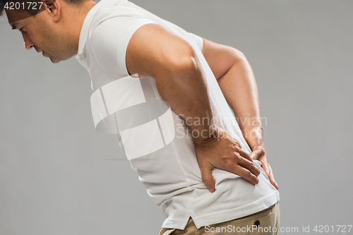 Image of close up of man suffering from backache