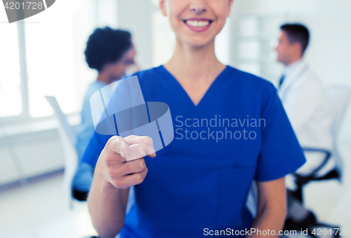 Image of close up of nurse pointing on you at hospital