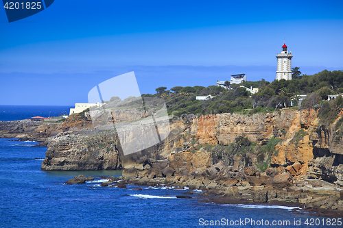 Image of Rocky Coast Extending into the Sea