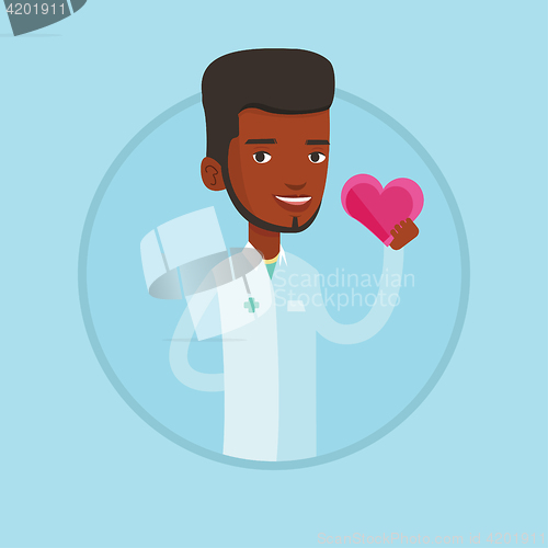 Image of Doctor cardiologist holding heart.