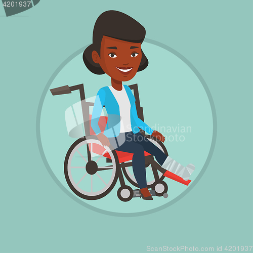 Image of Woman with broken leg sitting in wheelchair.