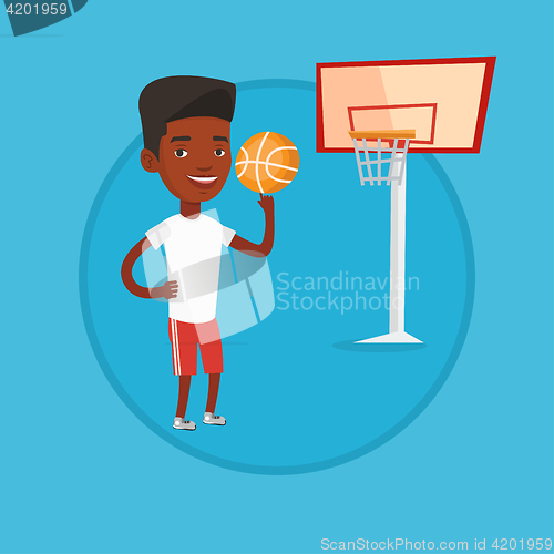 Image of African basketball player spinning ball.