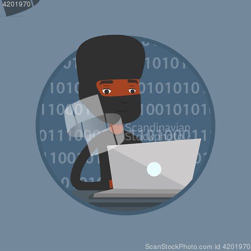 Image of Hacker using laptop to steal information.