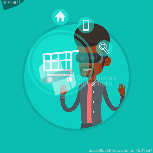 Image of Man in virtual reality headset shopping online.