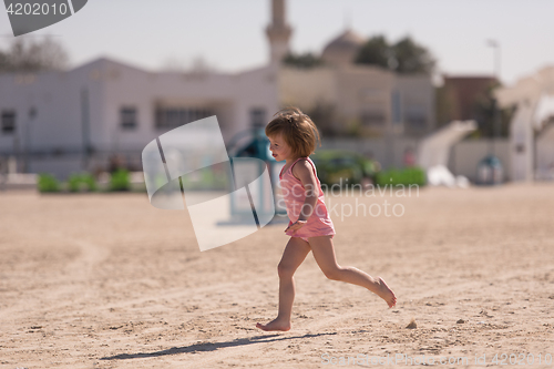 Image of little cute girl at beach