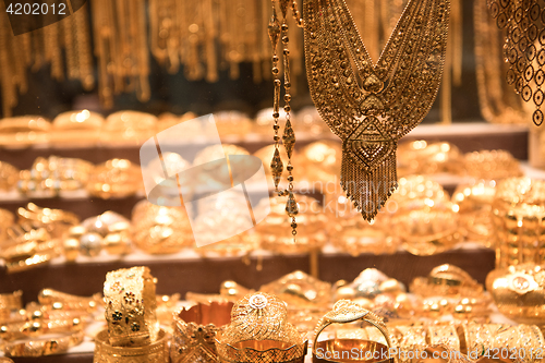 Image of gold jewelry in the shop window