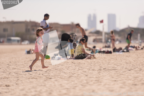 Image of little cute girl at beach