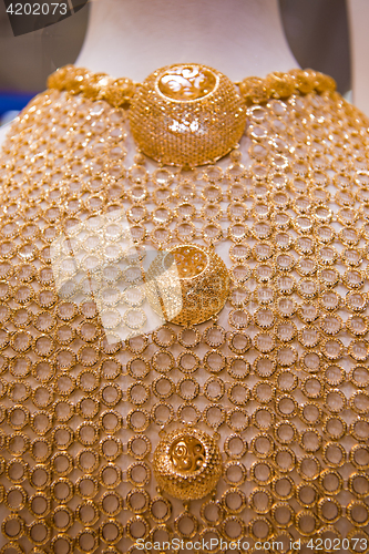 Image of gold jewelry in the shop window