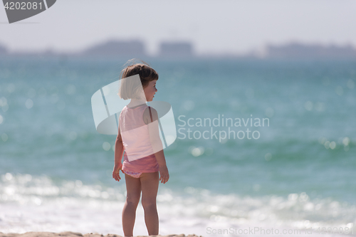 Image of little cute girl at beach