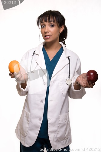 Image of Doctor with apple and orange