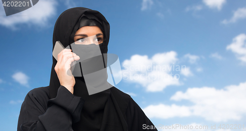 Image of muslim woman in hijab over white background