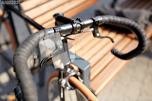 Image of close up of fixed gear bicycle on street