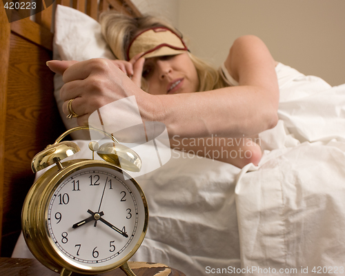 Image of Woman and alarm clock