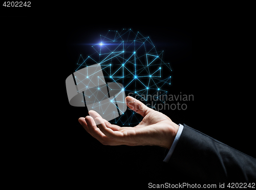 Image of close up of businessman hand with hologram