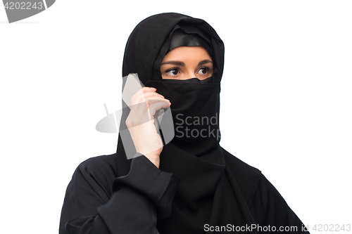 Image of muslim woman in hijab over white background