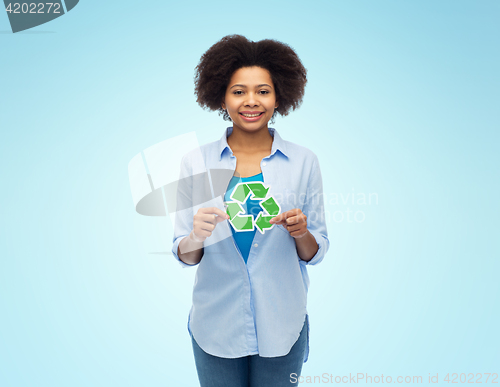 Image of happy afro american woman over blue background