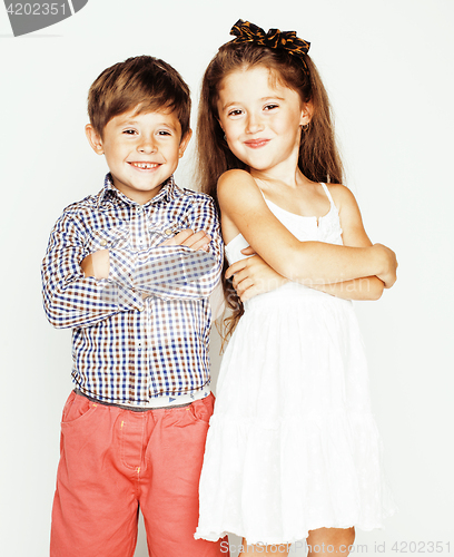 Image of little cute boy and girl hugging playing on white background, happy smiling family, lifestyle people concept 