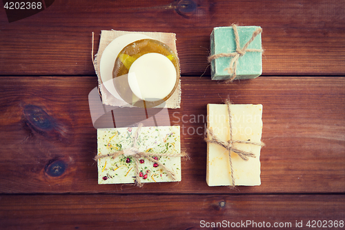 Image of close up of handmade soap bars on wood