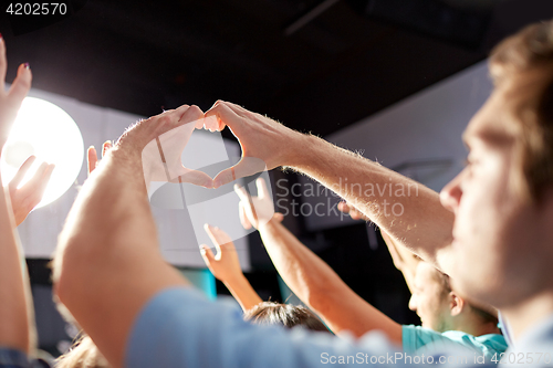 Image of group of people at concert in club