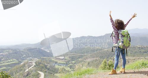 Image of Happy tourist on summit