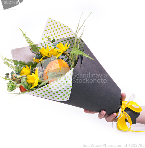 Image of Ranunkulyus bouquet of red flowers on a white background