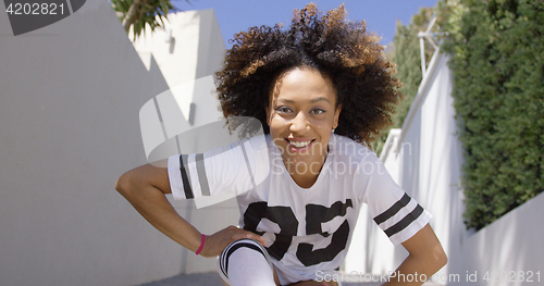 Image of Smiling female portrait looking at camera