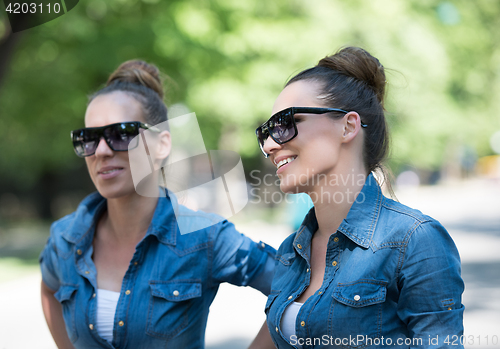 Image of twin sister with sunglasses